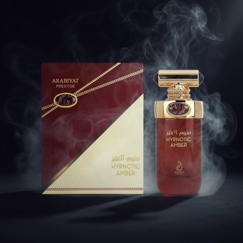 Hypnotic Amber perfume bottle and packaging with 'Arabiyat' branding on a white background.
