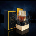 Perfume bottle and packaging with 'Khamran' branding on a white background