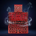 Red perfume bottle with intricate design and 'RAYHAAN' branding on a white background